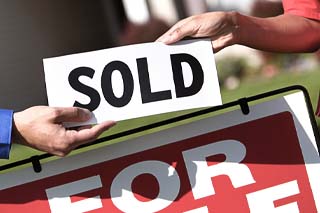 senior real estate service sell home michigan